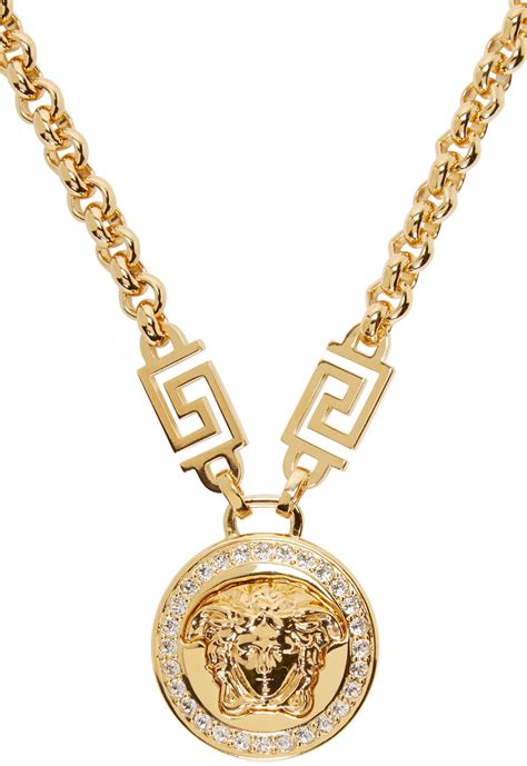 versace gold armor|Versace gold necklace.